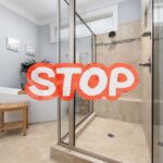 bagno con box doccia e scritta stop